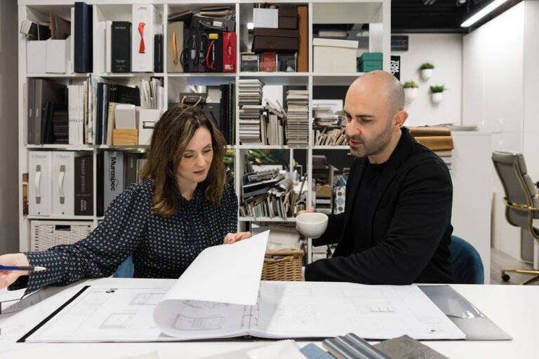 interior design meeting discussing projects and AI